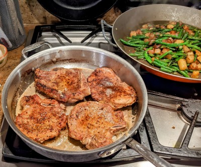 pan fried chops, plus green beans (fried in duck fat jal style).  normally I much prefer to cook thick cut ones, which require finishing in the oven, but tried the thin ones last night, which the kids inhaled